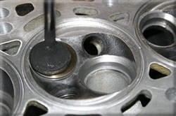 Chambered and machined cylinder head